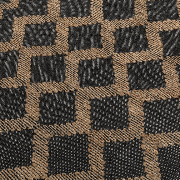 Close-up of rug texture: dark ground with natural chunky diamond blocks