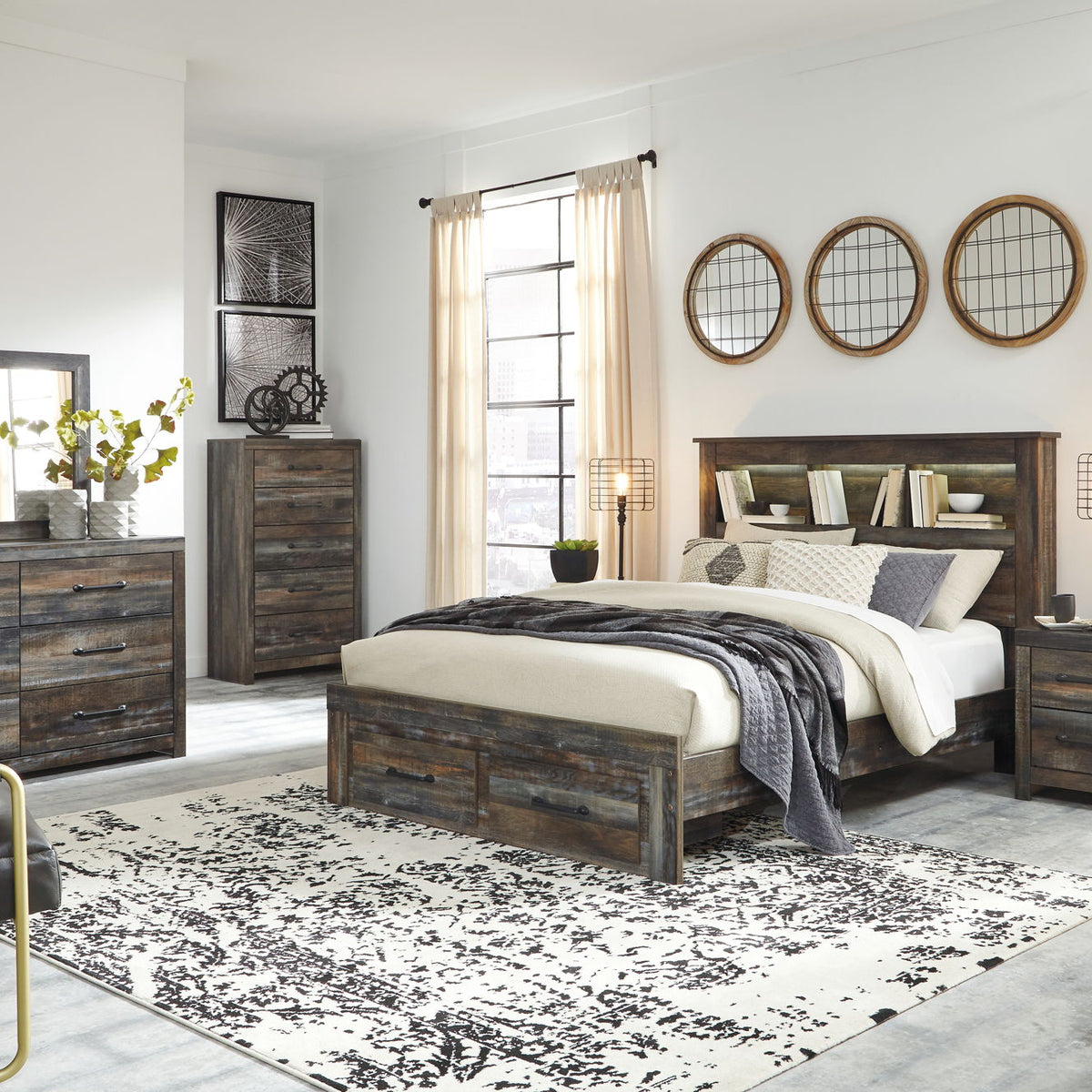 Panel bookcase bed with open shelves and side drawers, dark wood frame in a styled room.