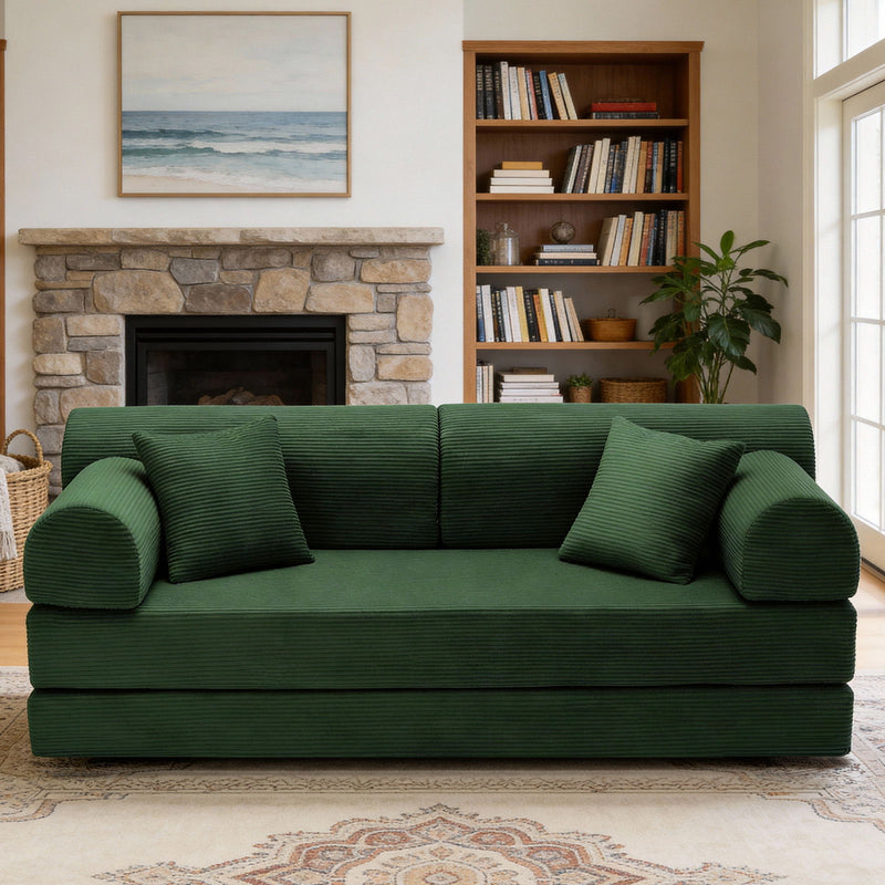 Dark green convertible sleeper sofa bed with three cushions and rounded armrests