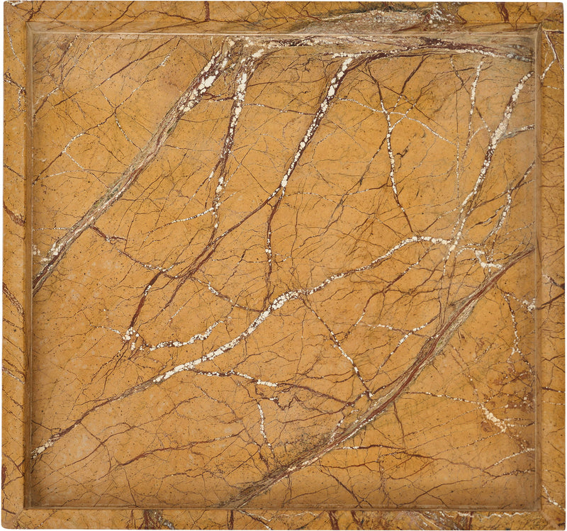 Yellow marble tray with bold dark veining across the interior surface.