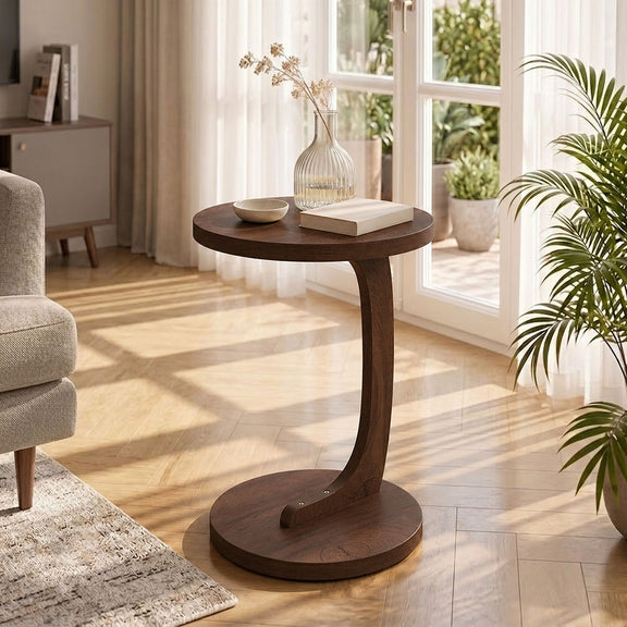 Dark brown round end table with pedestal base and lower shelf