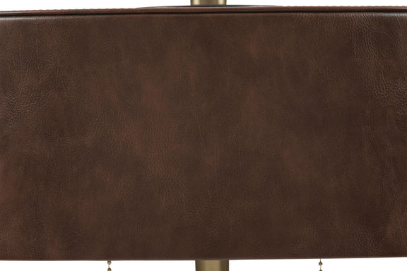 Close-up of brown drum shade fabric on a metal table lamp