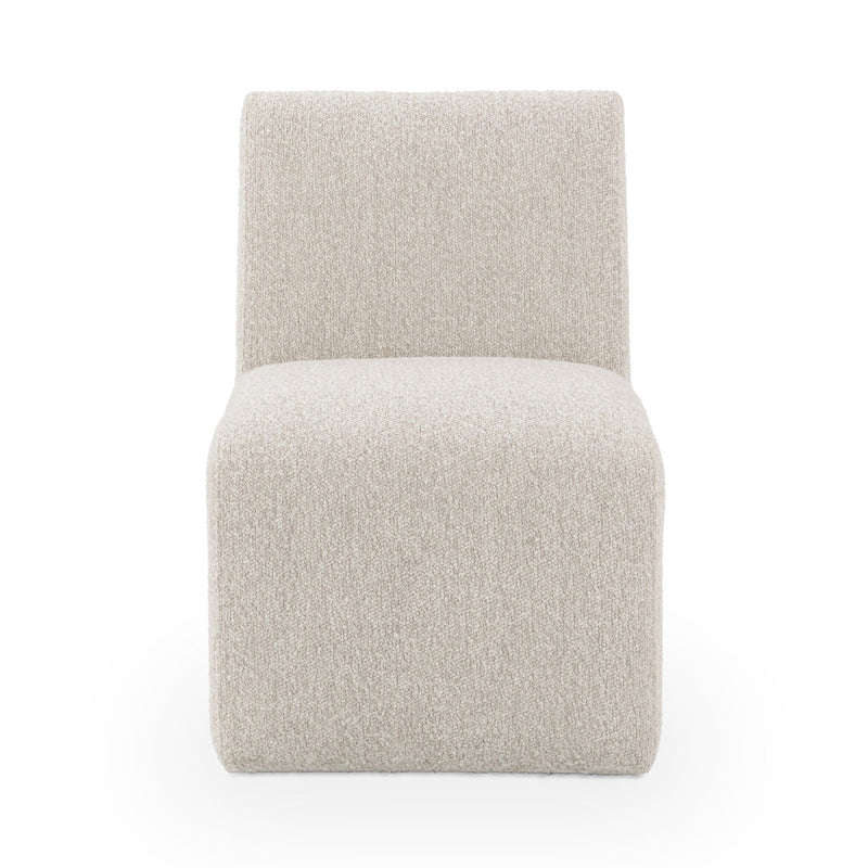 Upholstered dining chair in light beige fabric, front view with wide seat and back