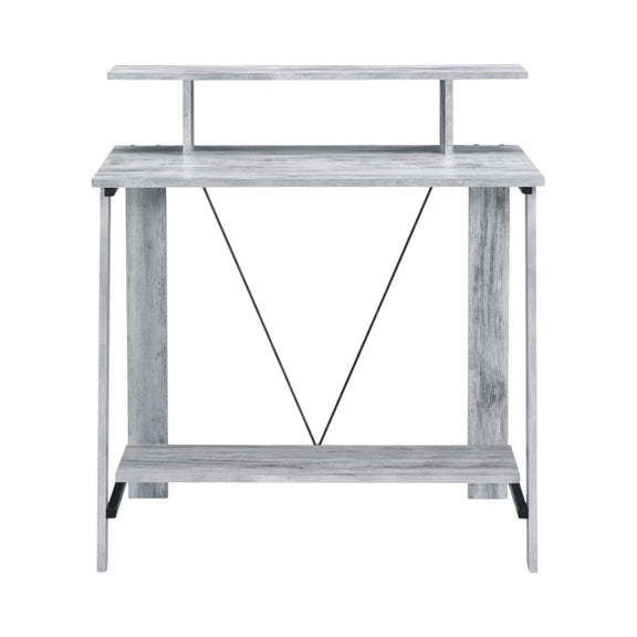 Modern writing desk with light wood finish, two tiers, and open X-brace support