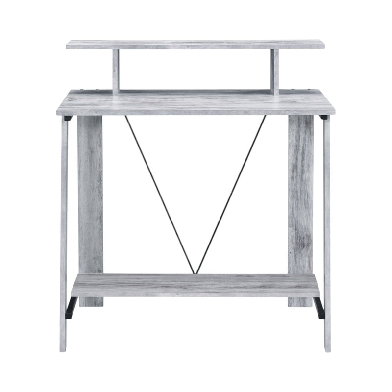 Modern writing desk with light wood finish, two tiers, and open X-brace support