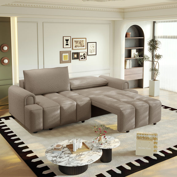 Light brown modular couch with extended chaise and storage seat cushions, tufted