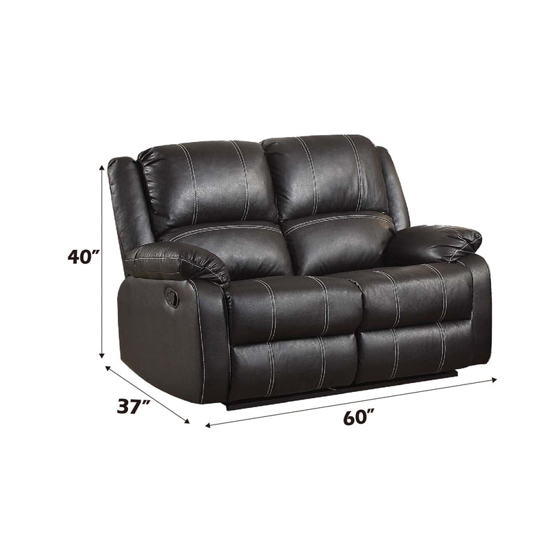 Black reclining loveseat chair with padded arms, tufted back, and recline lever