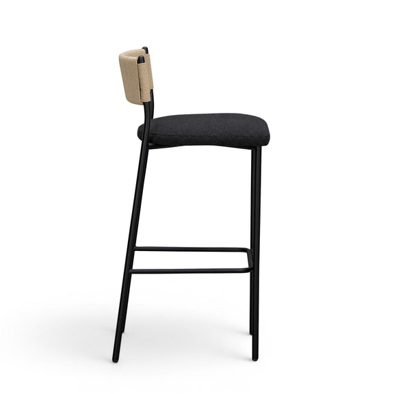 Celine boucle bar stool, side view: beige backrest, dark upholstered seat, black metal frame.