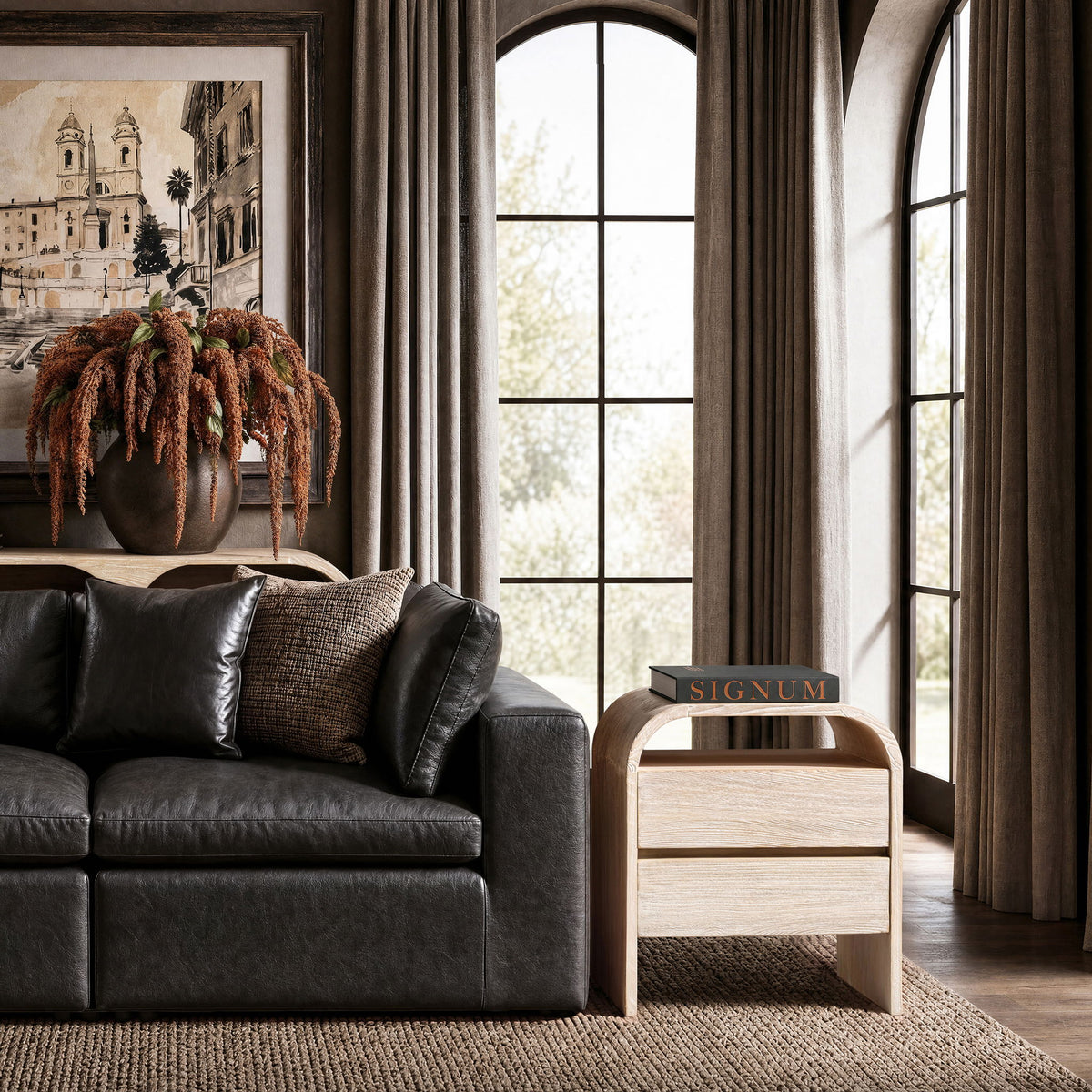 White-washed wood side table with two drawers beside a sofa