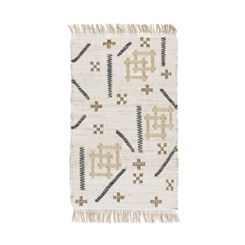 Ivory area rug with geometric pattern, black and tan accents, and fringed edges