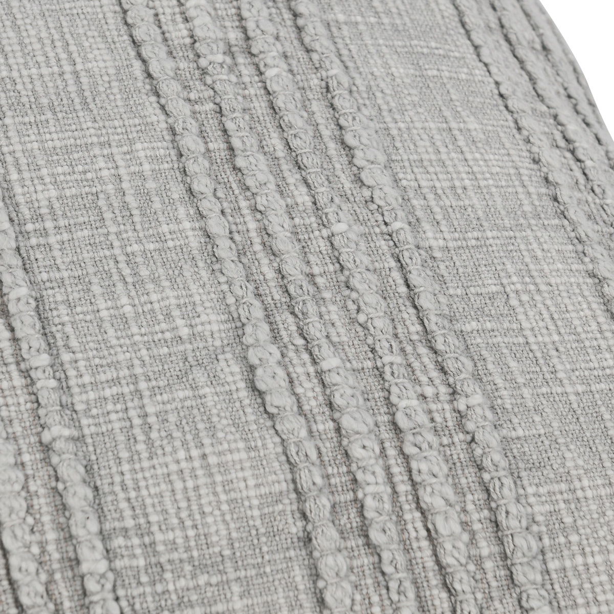 SLD pillow fabric close-up: gray textured weave with raised threads