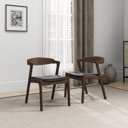 Pair of mid-century dining chairs with brown wood frames and dark gray seats, angled