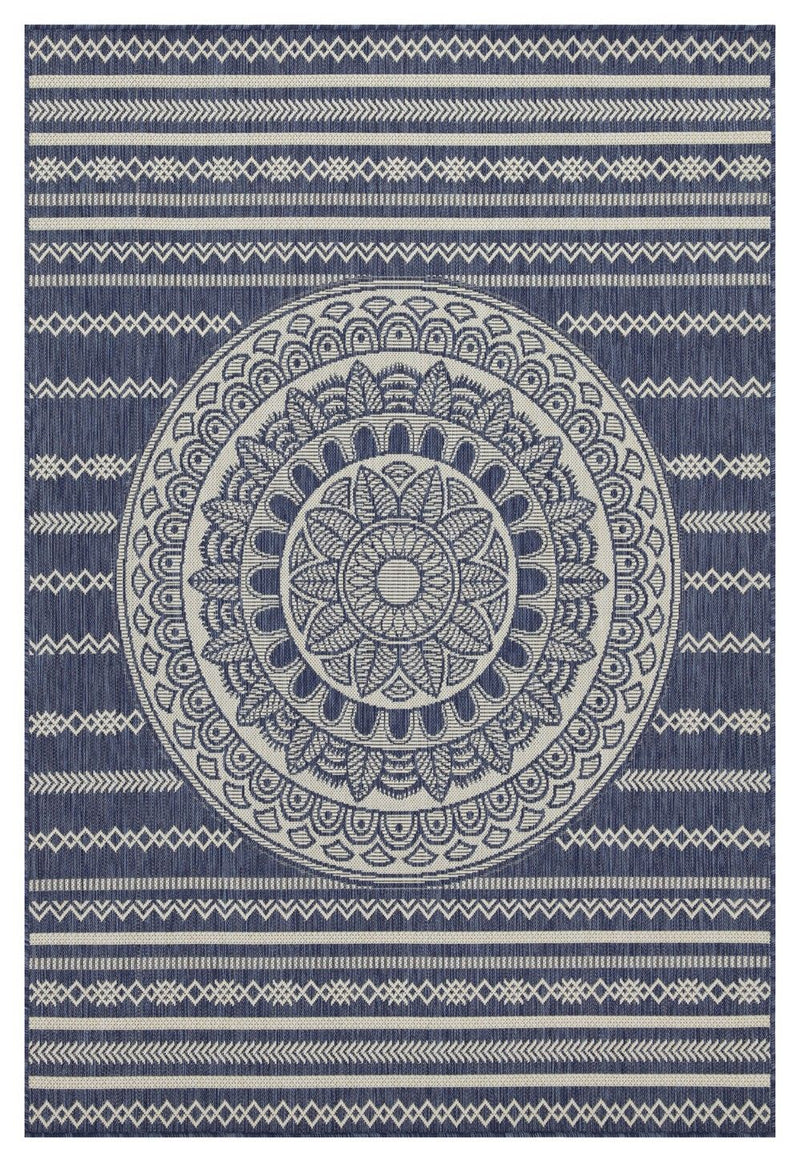 Indoor/outdoor area rug with navy-and-light-blue central medallion and decorative border bands