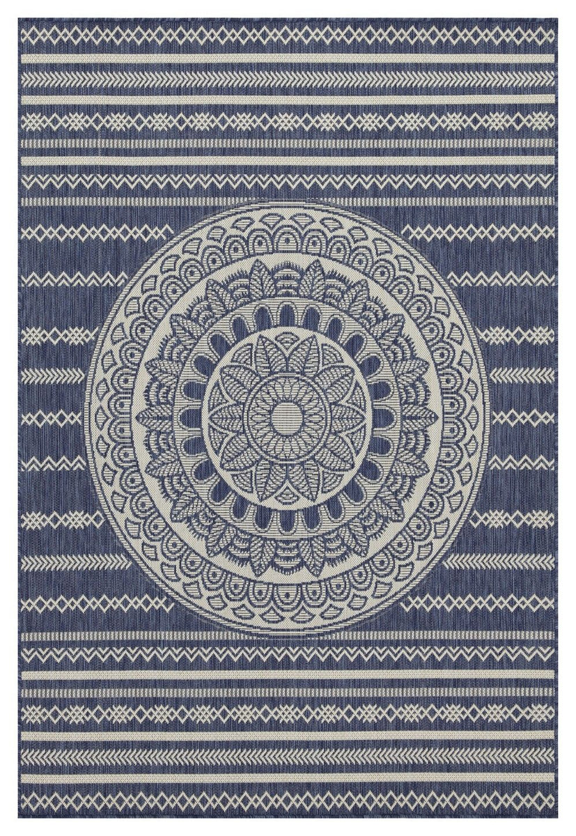 Indoor/outdoor area rug front view with blue mandala medallion and geometric stripe border