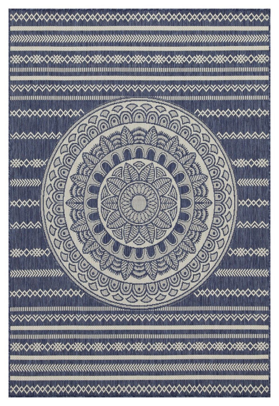 Indoor/outdoor area rug front view with blue mandala medallion and geometric stripe border