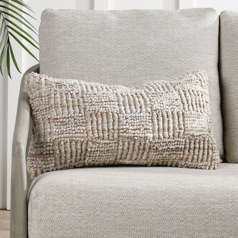 Ivory square textured throw pillow with raised knit stripe pattern