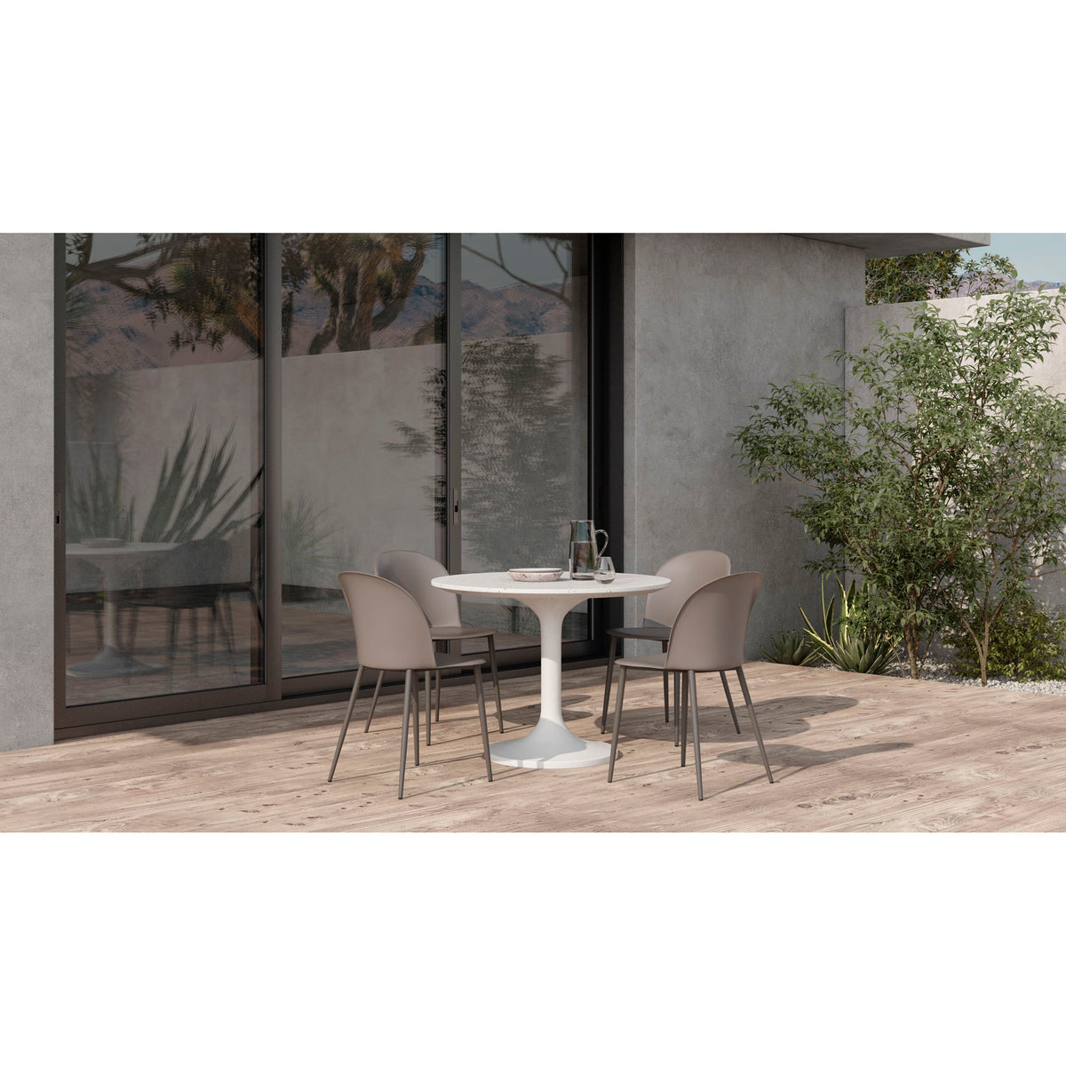 Pearl silver round cafe table with pedestal base on patio