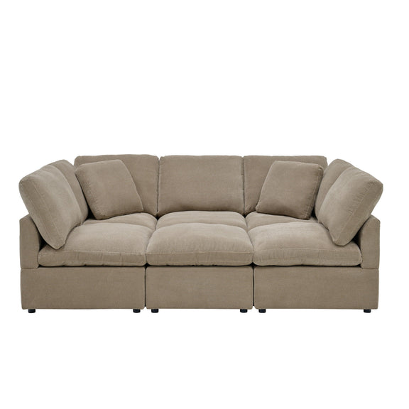 Front view of a light brown three-seat sofa with plush cushions