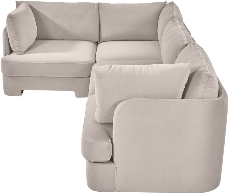 Light gray velvet performance fabric sectional with chaise corner and large accent pillows