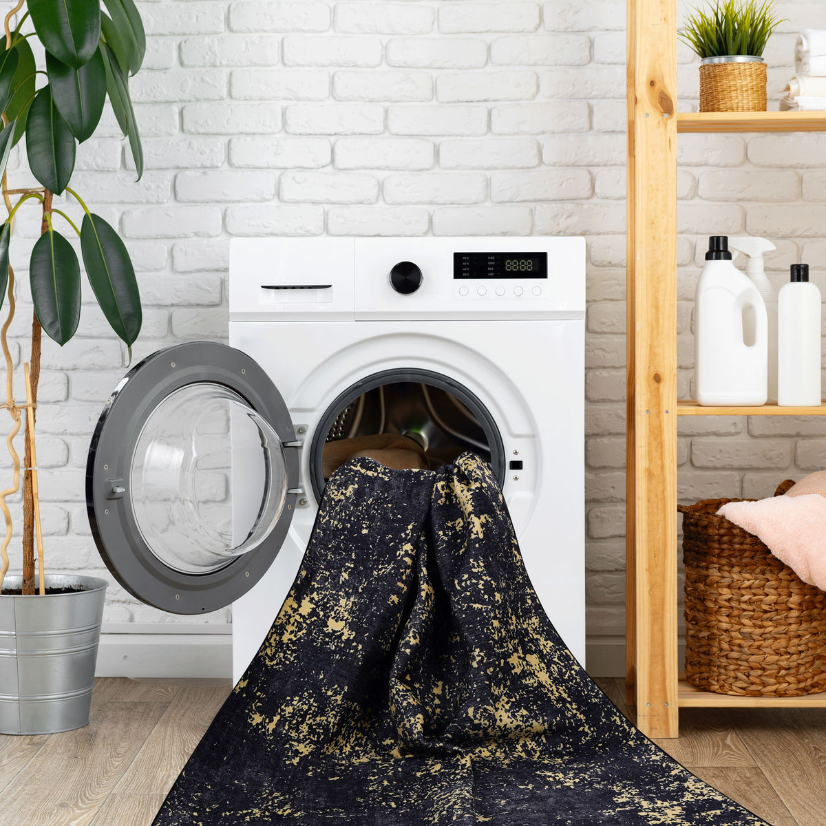 Washable dark navy runner rug with yellow speckle pattern covering the washer opening.