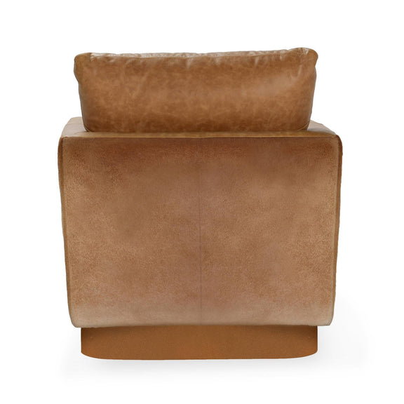 Brown leather accent chair with rounded arms and backrest