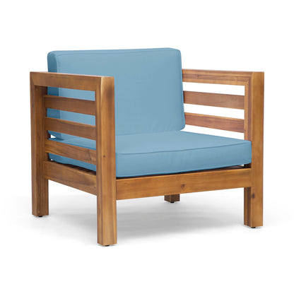 Outdoor acacia wood patio chair with light blue fabric seat and back cushion