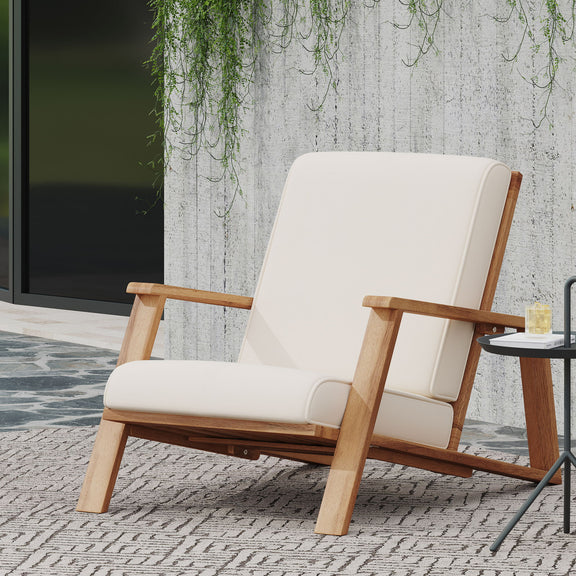 Beige outdoor lounge chair with padded seat and back, light wood armrests