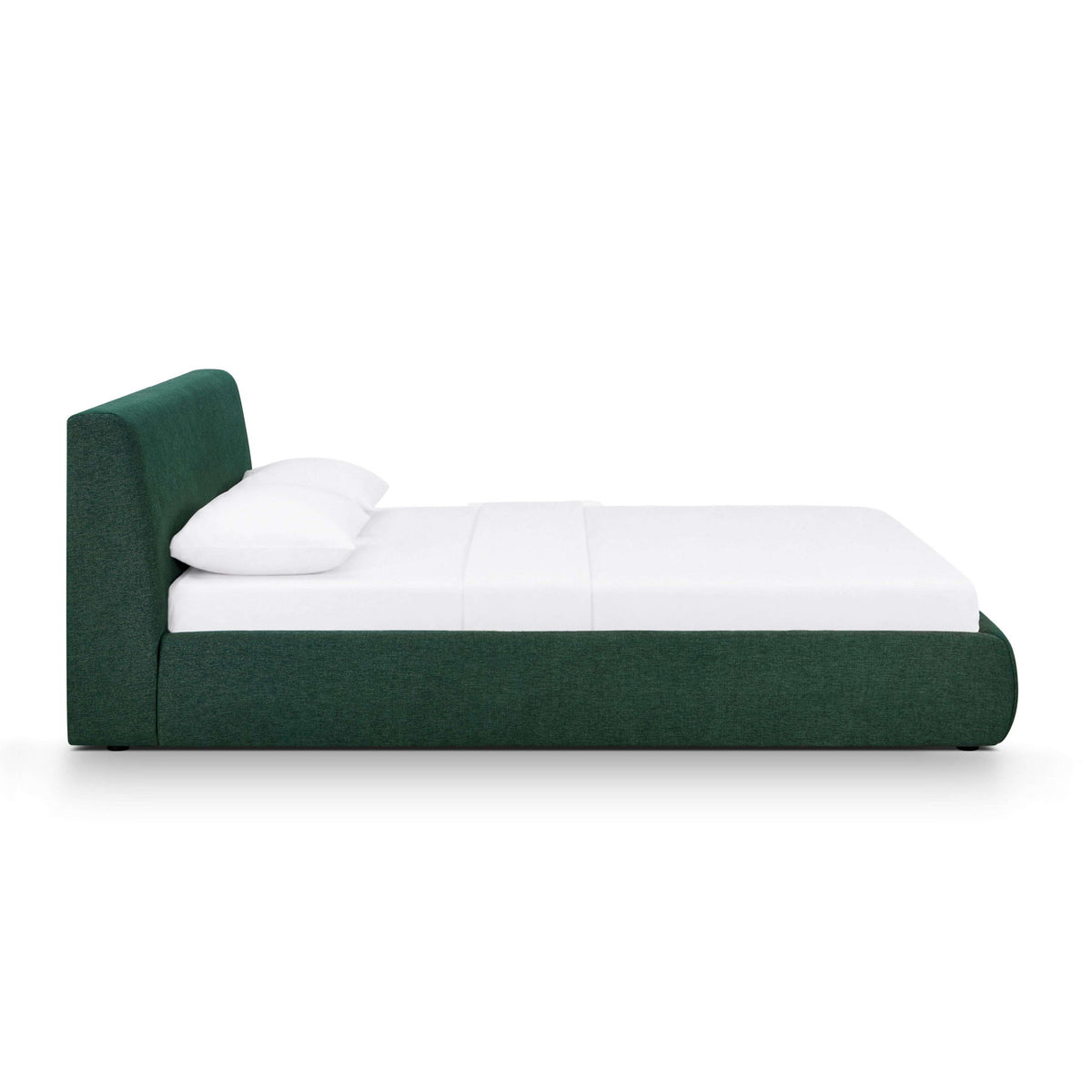 Dark green chenille performance bed with tall headboard and white pillows on mattress