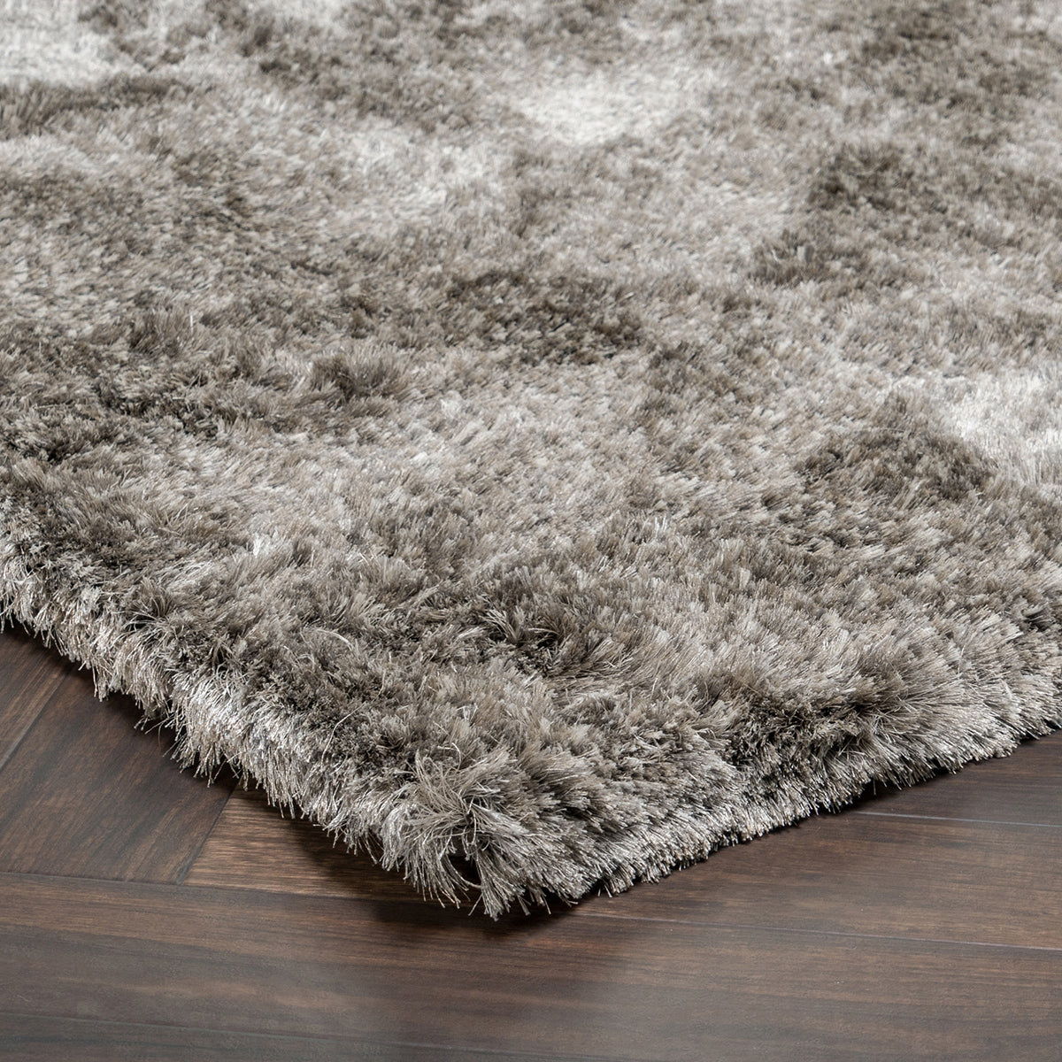 Carter shag rug, gray, close-up of looped high-pile texture and rug corner
