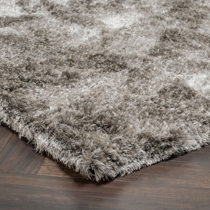 Carter shag rug, gray, close-up of looped high-pile texture and rug corner