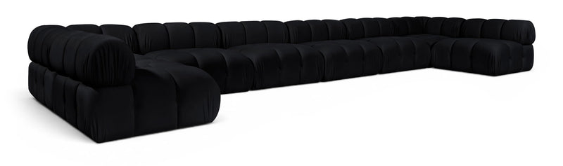 Black modular sectional sofa with padded chaise and corner modules