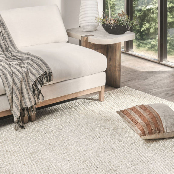 Ivory jute rug, rectangular flatwoven texture with low, even pile