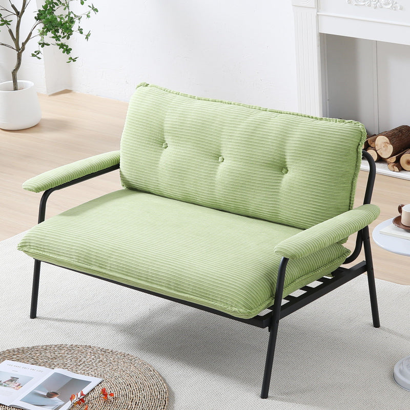 Light green metal frame sofa with striped cushions and padded backrest