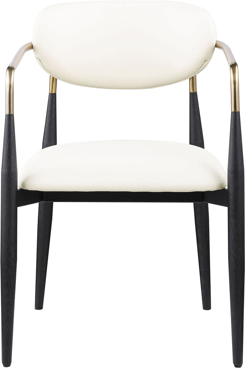 Upholstered dining arm chair with oval white seat and back, black legs, gold arm frame