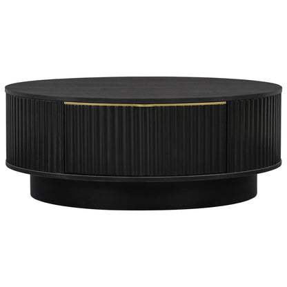 Black round coffee table with ribbed sides and storage drawer