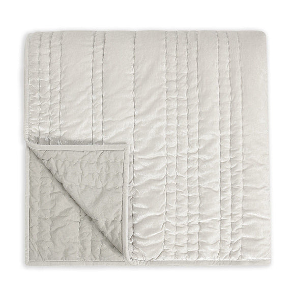 Ivory quilted decorative sham with vertical channel stitching