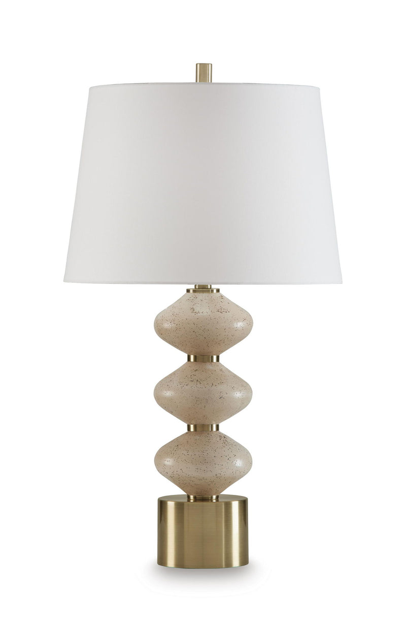 Beige fabric shade over speckled beige and gold table lamp base
