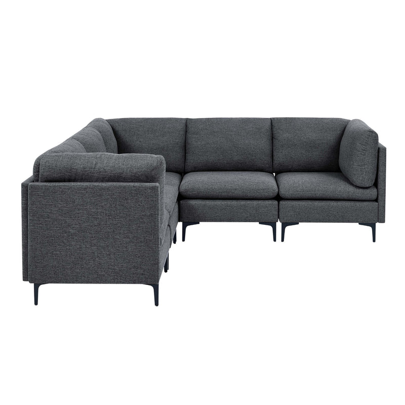Dark gray modular sectional with left chaise, tall tapered legs, and thick cushions