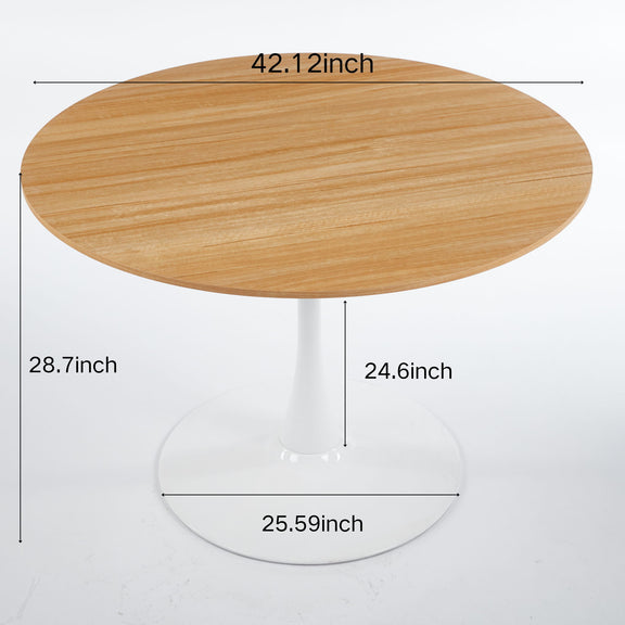 Light brown round dining table top on white tulip pedestal base