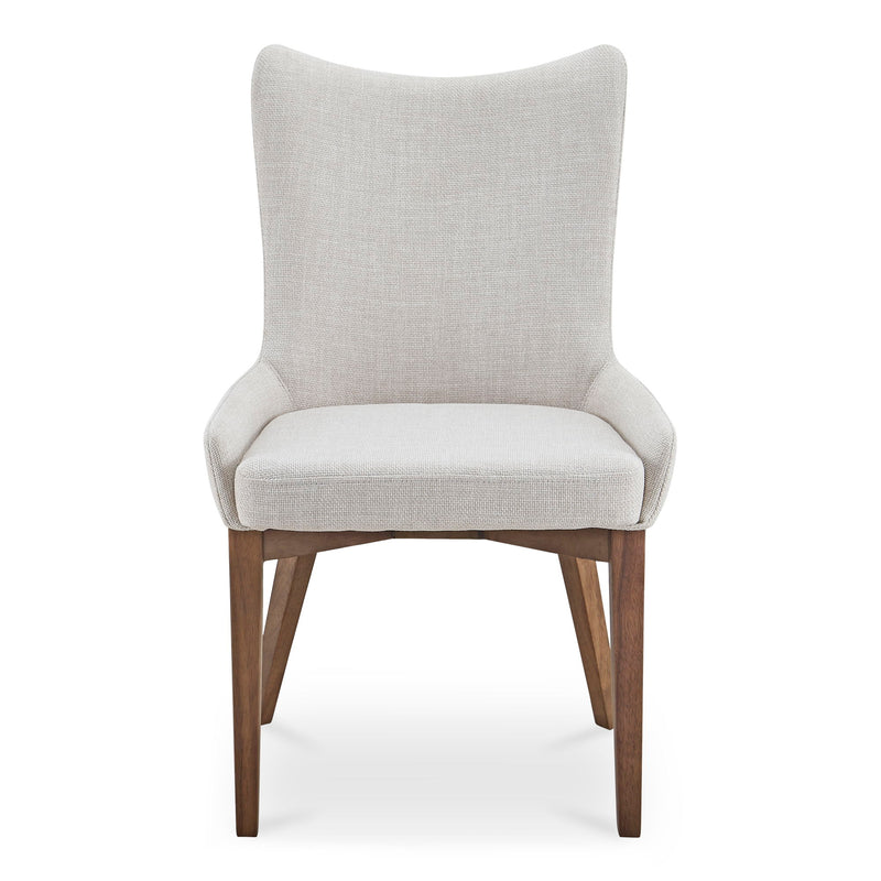 Potter heather beige dining chair with a curved upholstered back and walnut-tone legs