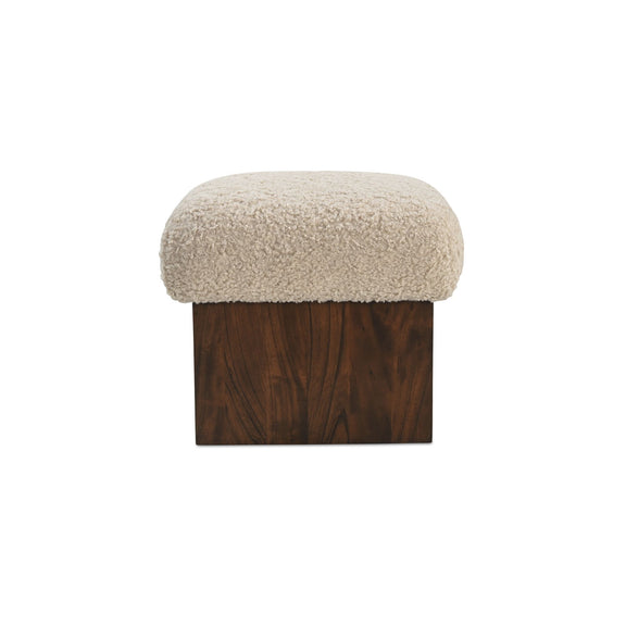 Cream faux shearling ottoman with dark brown wooden base