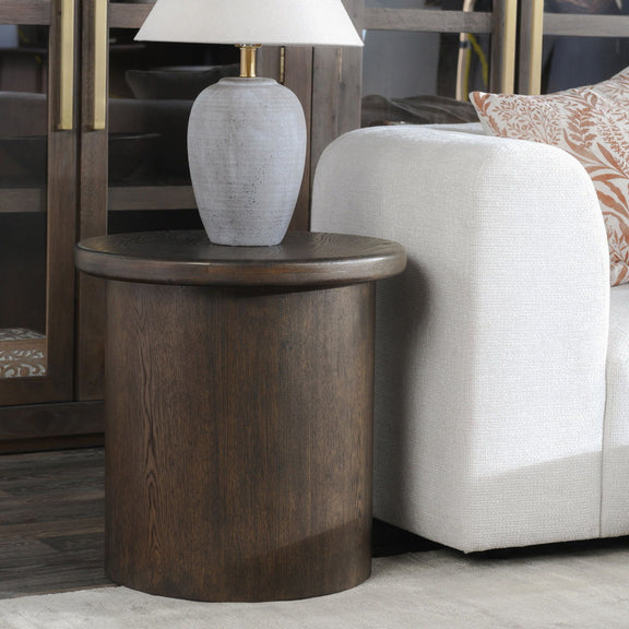 Coffee-brown oak veneer round end table with cylindrical base and smooth tabletop