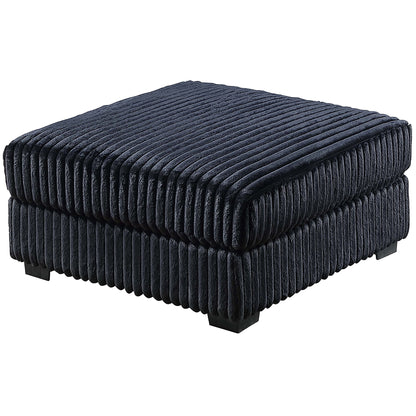 Black corduroy upholstered ottoman with ribbed sides and padded square top