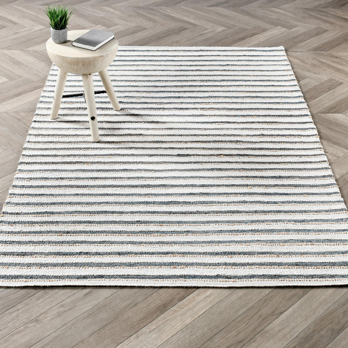 2.6 ft x 8 ft striped rug with ivory base and thin blue horizontal lines