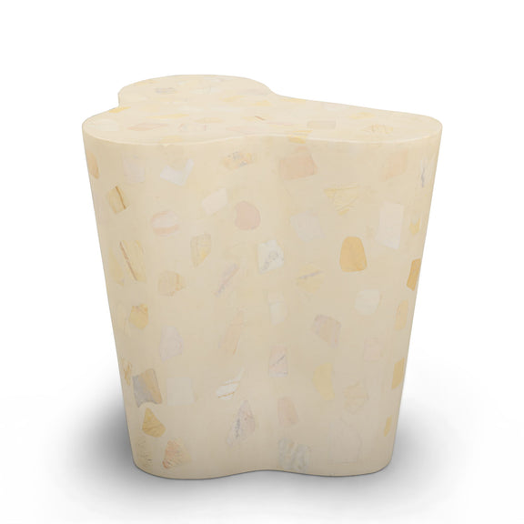 Beige terrazzo-pattern side table with rounded, contoured top and base
