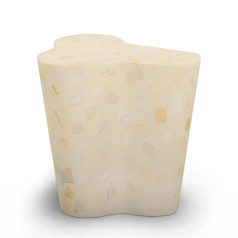 Beige terrazzo-pattern side table with rounded, contoured top and base