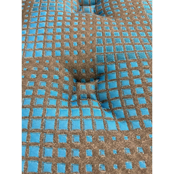 Blue grid support insert with gray foam core mattress surface texture