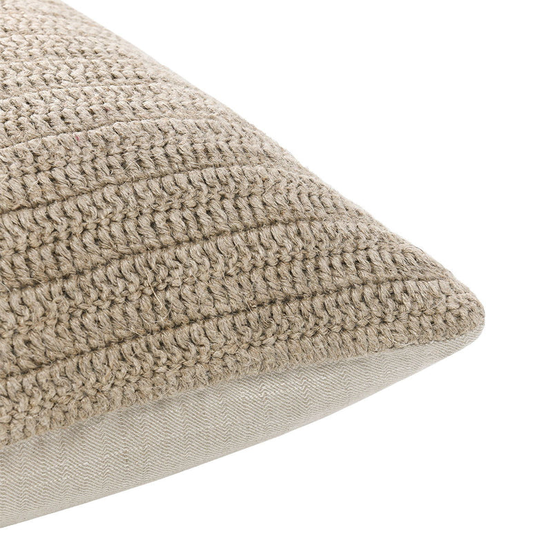 Textured beige knit lumbar pillow with close-up woven stripe pattern