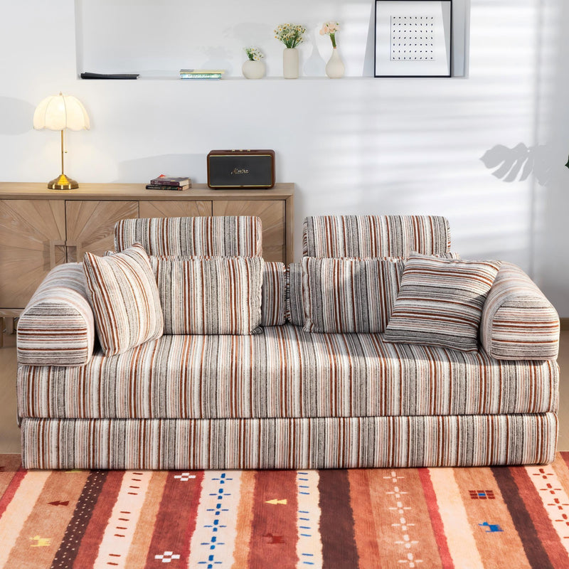 Striped sleeper sofa bed with rolled arms and 3 back pillows, front view