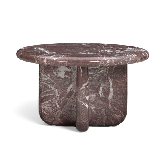 Round dark red marble-look coffee table with white veining and pedestal base